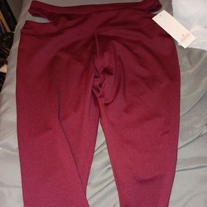 Burgundy red leggings with openings on hips